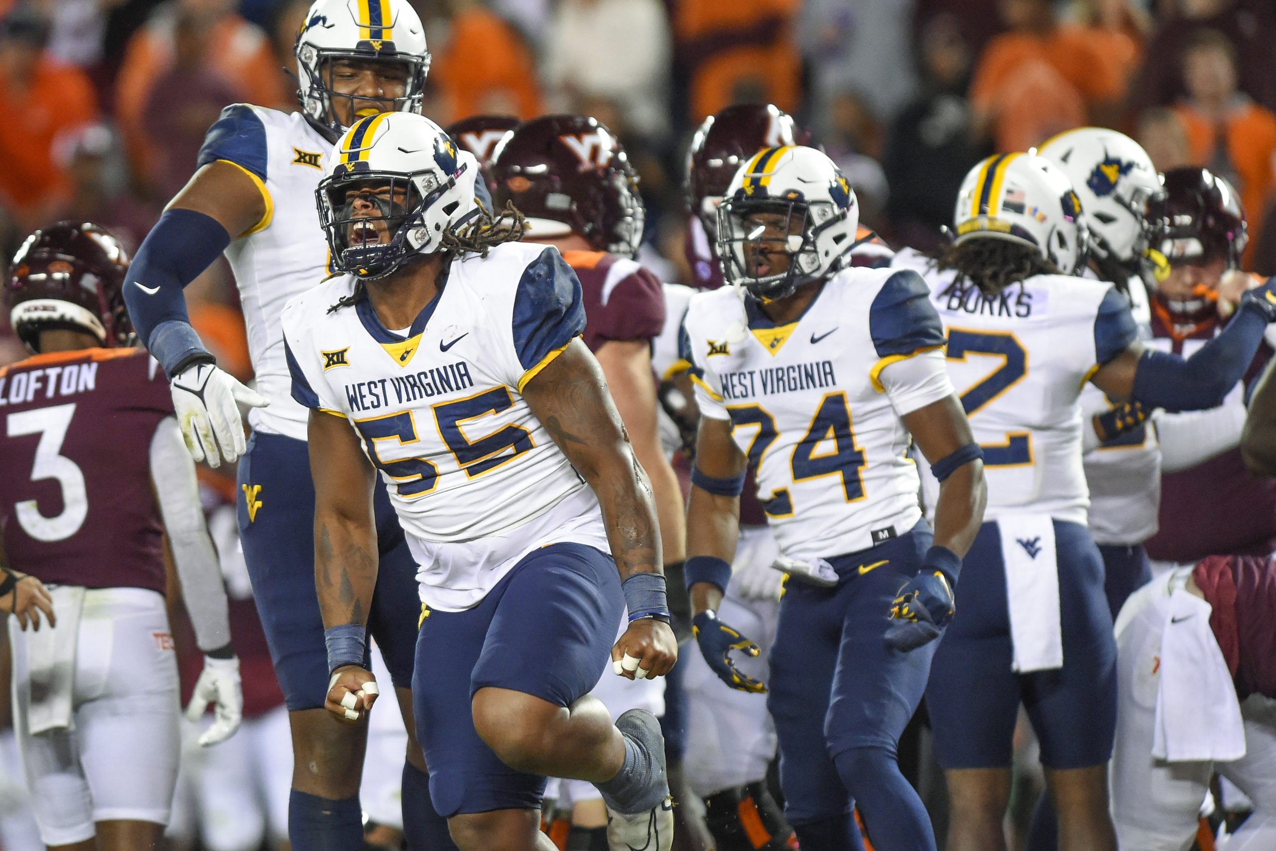 Jacolby Spells' pick-6 pushes WVU past Virginia Tech 33-10 to keep Black Diamond Trophy
